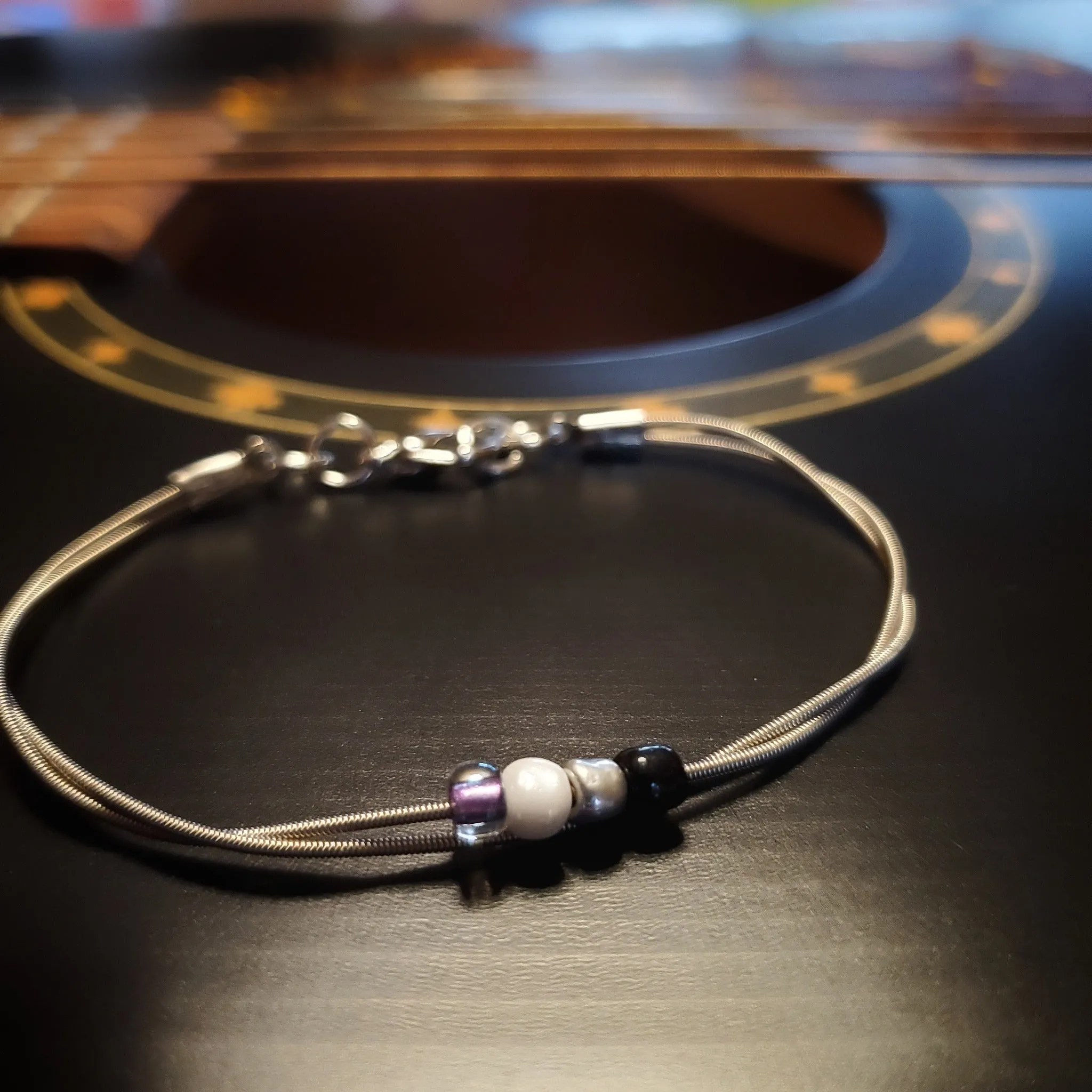 Asexual Pride Upcycled Guitar String Bracelet